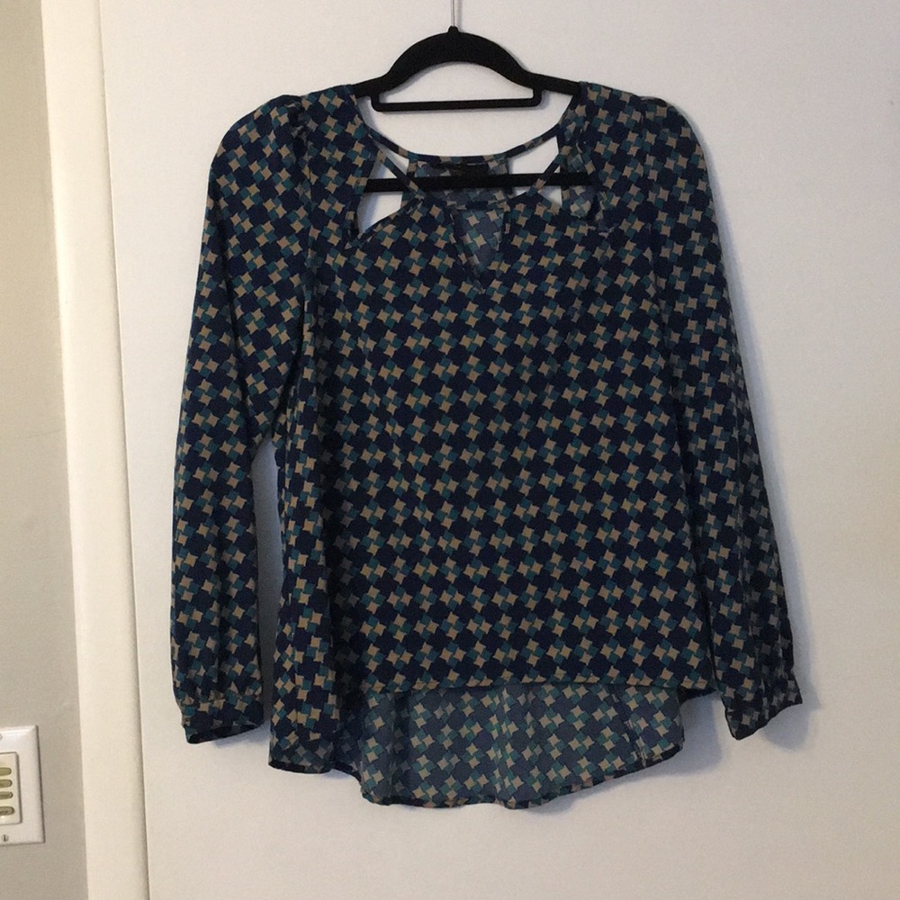 Dressy shirt! Triangle cut outs in front and back